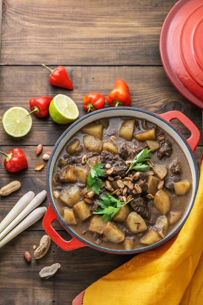 istock Thai massaman curry with beef and potato, top view copy space 1027344328