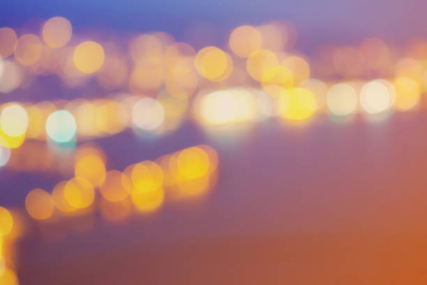 istock Abstract background selective focus bokeh lights of big city 1027345068