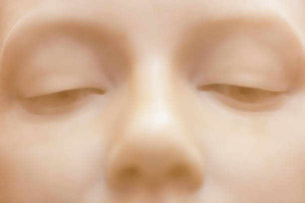 istock Closeup old marble statue of angel, background with copy space 1027347600