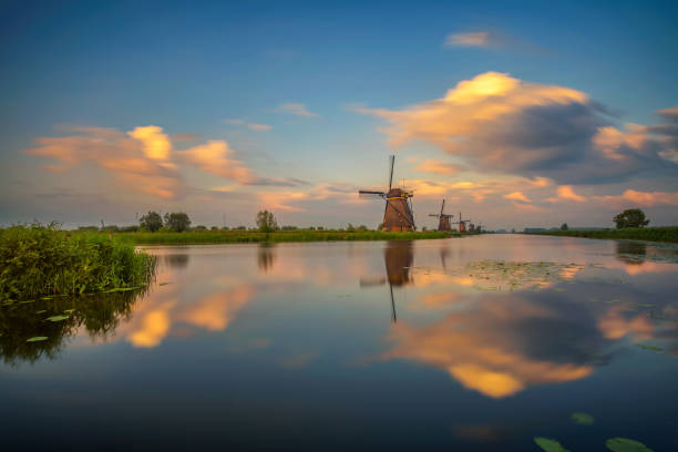 istock Sunset above old dutch windmills in Kinderdijk, Netherlands 1027350770