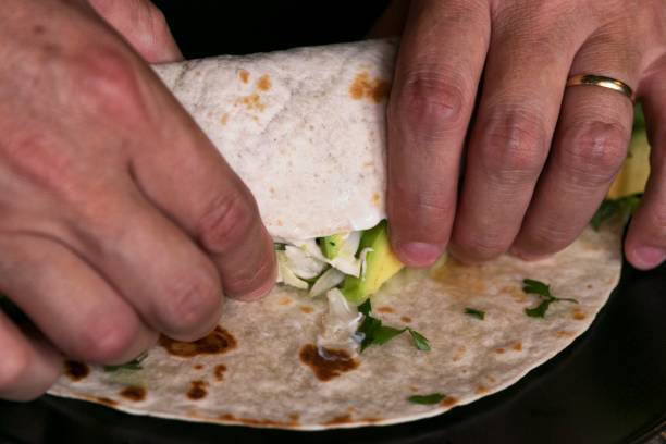 istock Making of tortilla. Home cooking. 1027355632