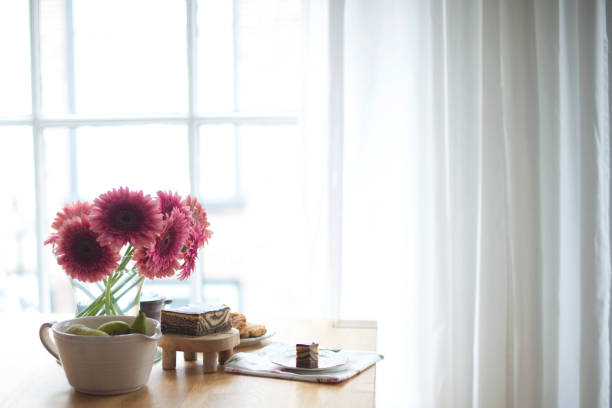 istock Delicious homemade pie for breakfast. Baking and flowers on the table. 1027359012