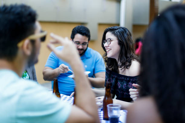 istock Young friends having lunch outdoors on a barbecue party 1027361438