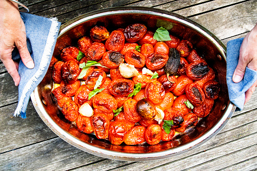 Mediterranean, Italian or Spanish, roasted tomatoes with garlic, basil and anchovies.