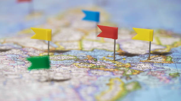 istock World tour route marked with pins on map, travel destinations, active lifestyle 1027397488