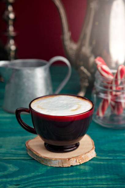 istock Holiday Coffee on a Blue Wood Counter 1027397736