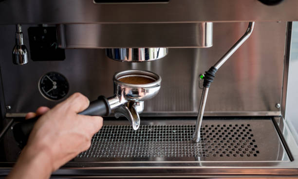 istock Unrecognizable person making a fresh cup of coffee 1027410176