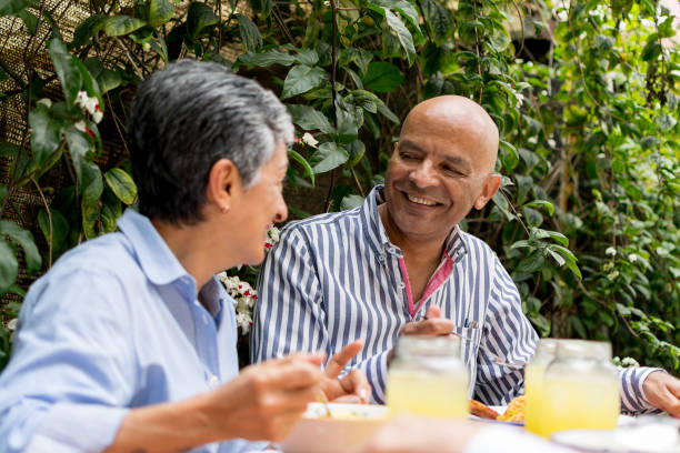 istock Elder couple enjoying their lunch outside 1027410296