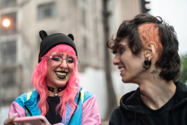 istock Alternative Lifestyle Young Friends Using Mobile at City 1027418744