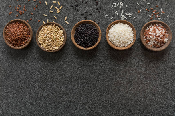 istock Variation of bowls of different rice background 1027427796