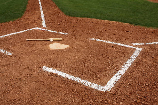 istock Baseball Home Plate with Ball and Bat 102743077