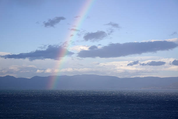 istock Rainbow Coming out of the Sea 102744997