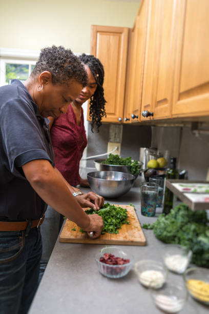 istock preparing and cutting kale to make a salad 1027455664