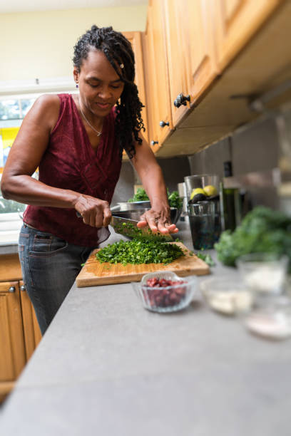 istock preparing and cutting kale to make a salad 1027455678