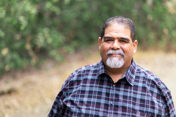 Senior Mexican Man Smiling Portrait of a Senior Mexican Man fat mexican man pictures stock pictures, royalty-free photos & images
