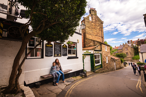 York, Yorkshire, England - May 08, 2022: Daytime view of a pedestrian courtyard on Parliament Street in York.