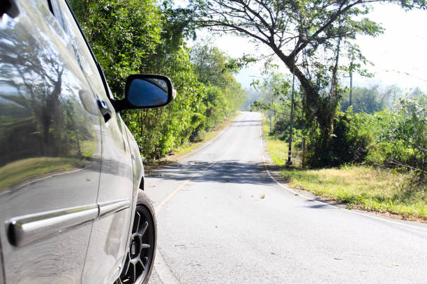 istock Travel car on road trip 1027472446