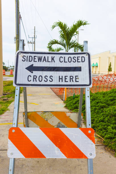 istock Construction safety sign warns pedestrians the sidewalk is closed 1027475226