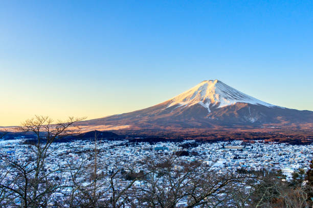 istock Beautiful Mount Fuji in winter with snow in Japan 1027480520