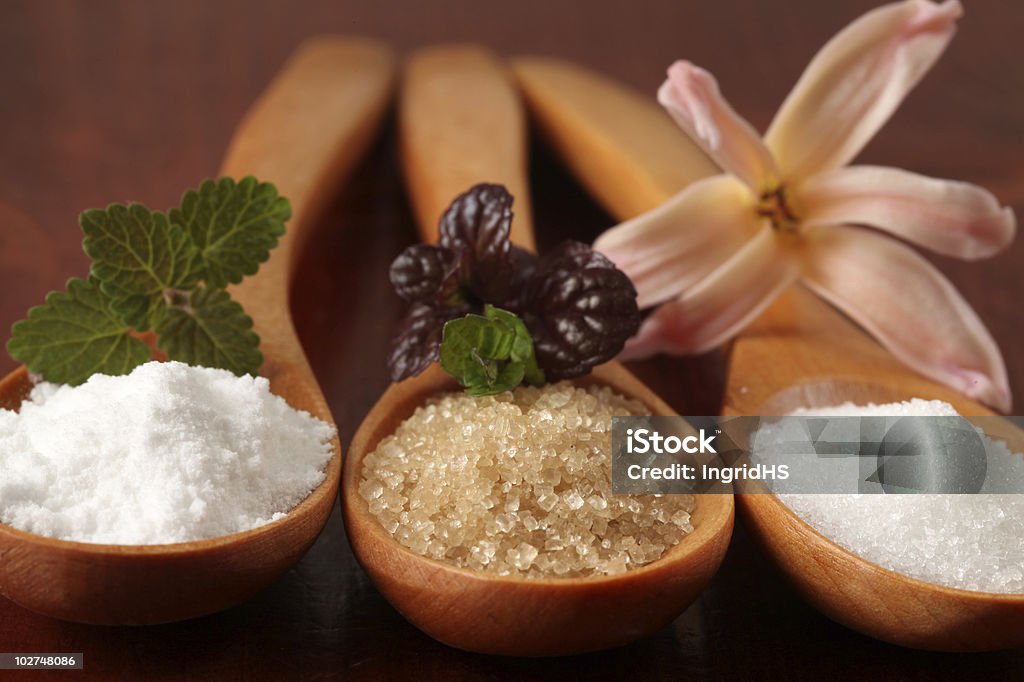 Sugar in wooden spoons  Brown Sugar Stock Photo