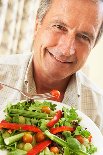istock Senior Man Eating A Healthy Salad 102748904
