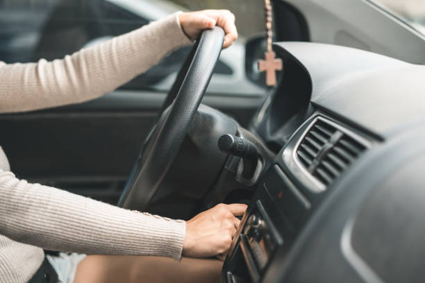 istock Woman driver starting the car 1027504410