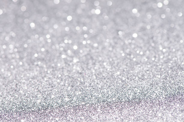 istock abstract sparkling lights, holiday festive background 1027516080