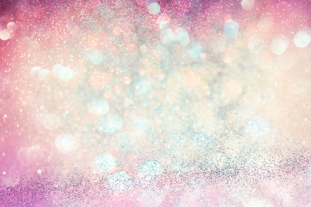 istock abstract sparkling lights, holiday festive background 1027516300