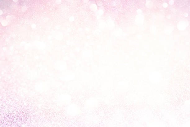 istock abstract sparkling lights, holiday festive background 1027516556