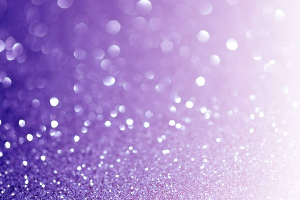 istock abstract sparkling lights, holiday festive background 1027516690