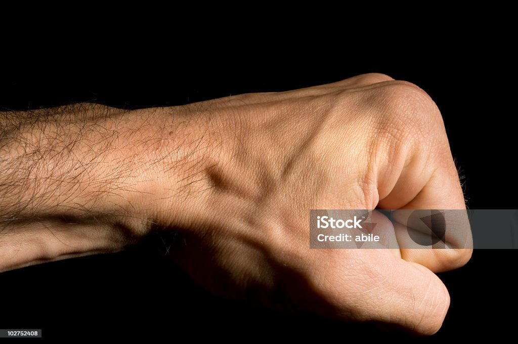 Angry fist  Adult Stock Photo