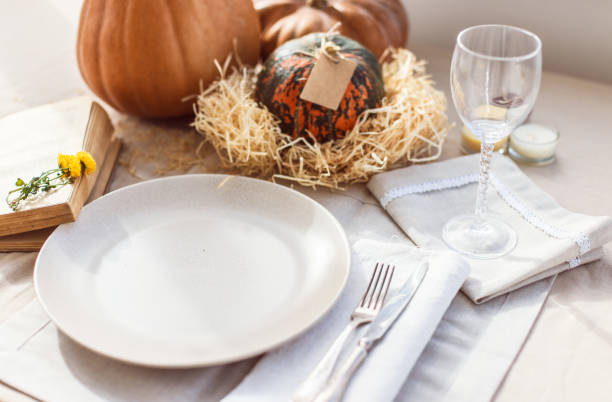 istock Autumn table settings with pumpkins. Fall home country decoration for festive dinner 1027530448