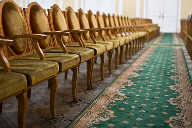 istock Wooden chairs in a row. 102753432