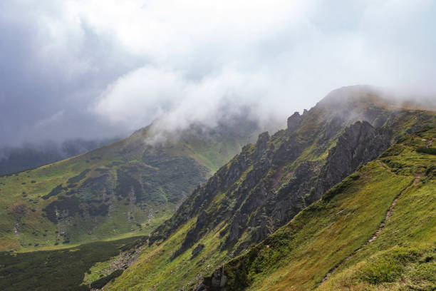 istock Mountain in misty cloud and fog 1027537316