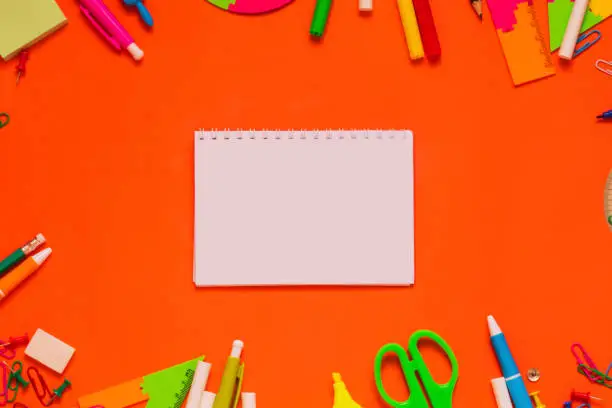 School and study supplies ready for design  with note on orangeboard