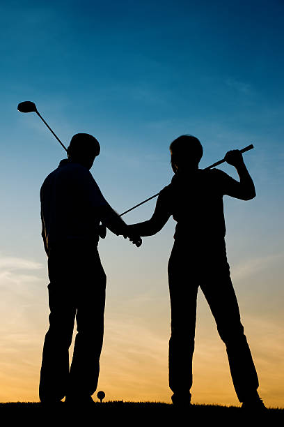 istock Senior couple playing Golf at sunset 102753862
