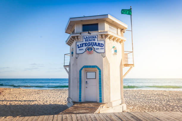 Laguna Beach lifeguard tower Laguna Beach, California - August 8, 2017: famous Laguna Beach lifeguard tower in sunset light on a Main beach laguna beach california photos stock pictures, royalty-free photos & images