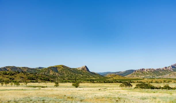 istock summer landscape with hills and rocks, Crimea 1027550414