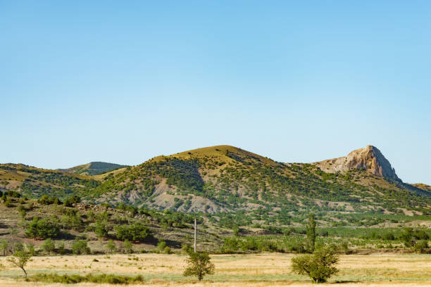 istock summer landscape with hills and rocks, Crimea 1027550450