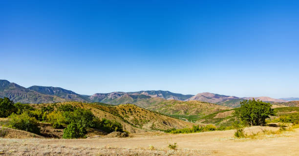 istock summer landscape with hills and rocks, Crimea 1027552512