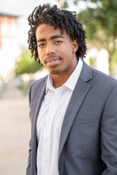 istock Young handsome African American man smiling outside. 1027555938