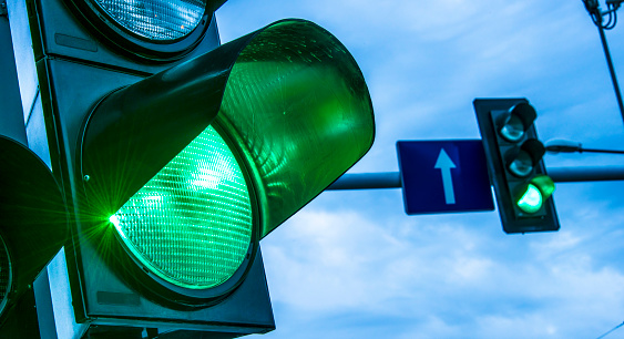 Traffic lights over urban intersection.