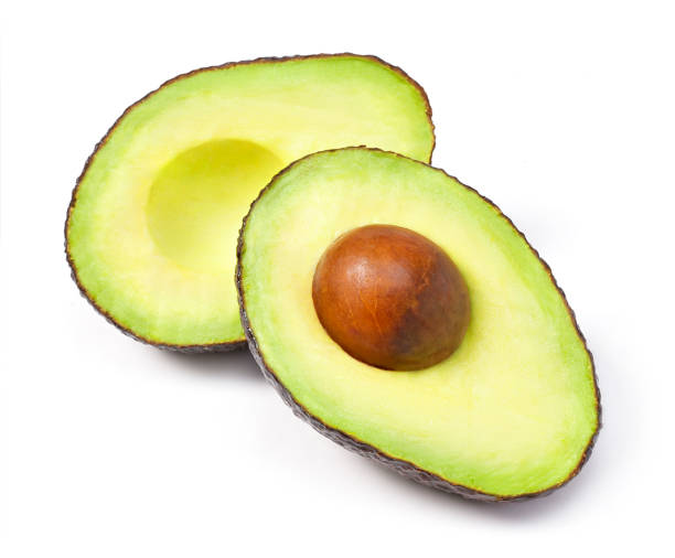 вкусные свежие фрукты авокадо, изолированные на белом фоне - avocado portion fruit isolated стоковые фото и изображения