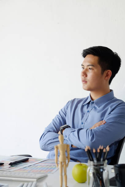 istock A man thinking a ideas with creative job on artist workplace. 1027574622