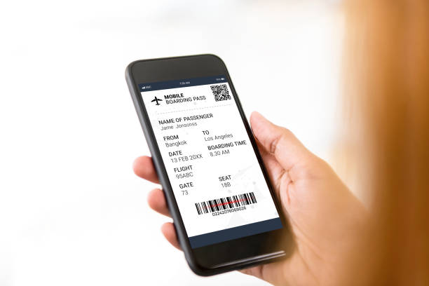istock Passenger looking at electronic boarding pass on smartphone screen 1027575138