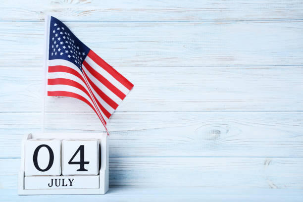 istock American flag with cube calendar on wooden table 1027575370