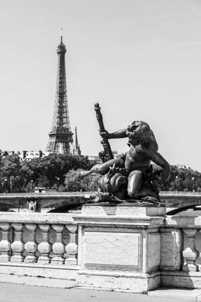 istock Pont Alexandre III Bridge (details) and Eiffel Tower. Paris, France 1027578042