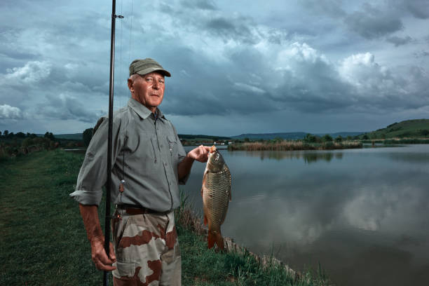 istock senior man fishing 1027582272
