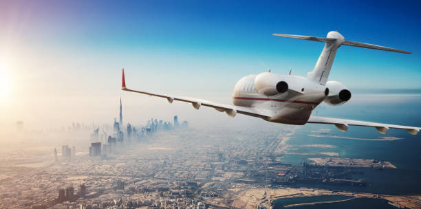istock Luxury private jetliner flying above Dubai city, UAE. 1027582646