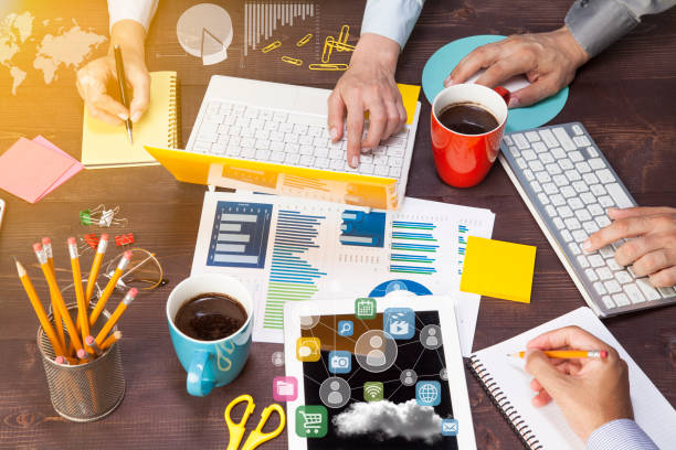 istock Business People Meeting using laptop computer, tablet pc, chart paper for analysis business strategy 1027585698